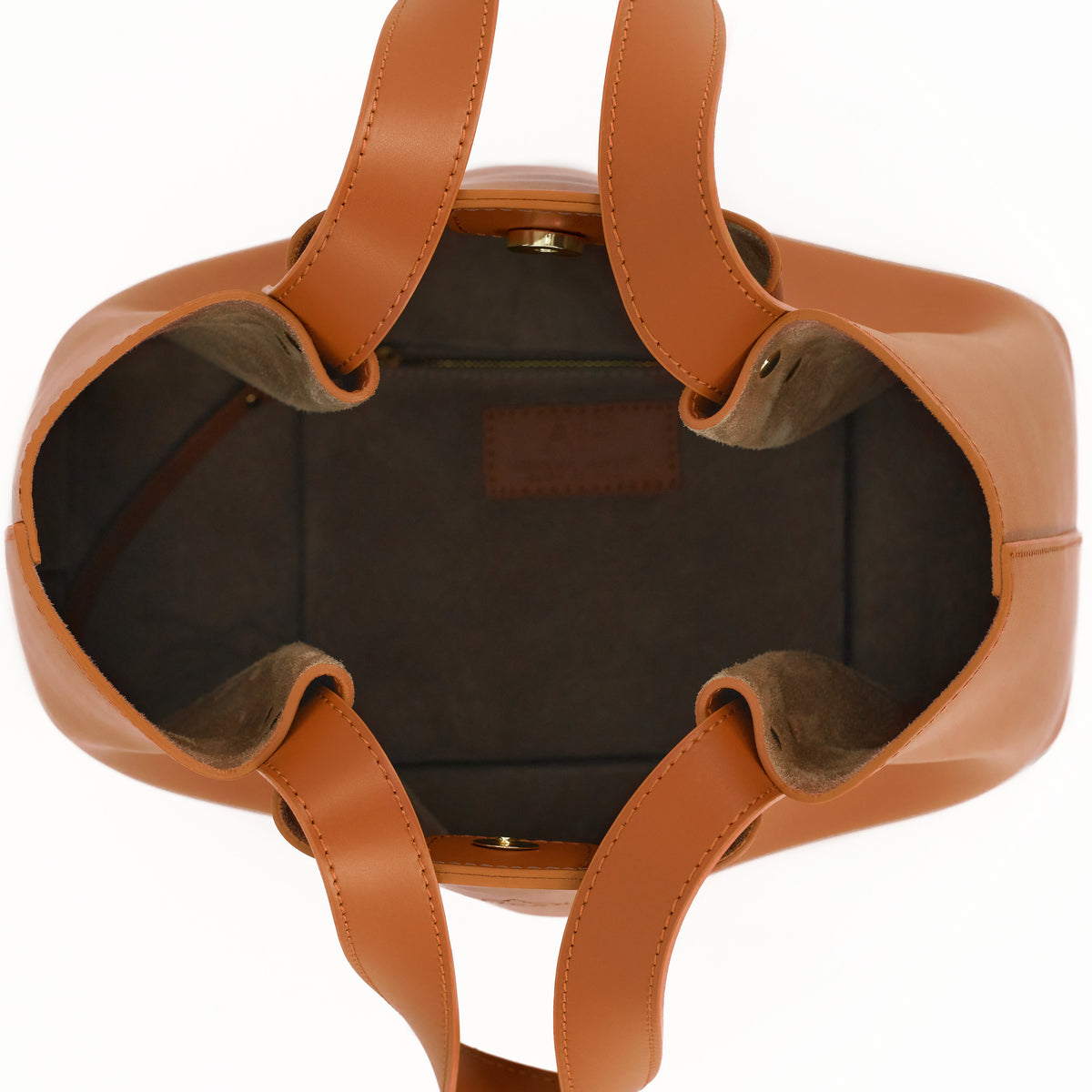 Viviene Tote, slim tote in camel Italian Ruga leather – open, showing the suede-lined interior