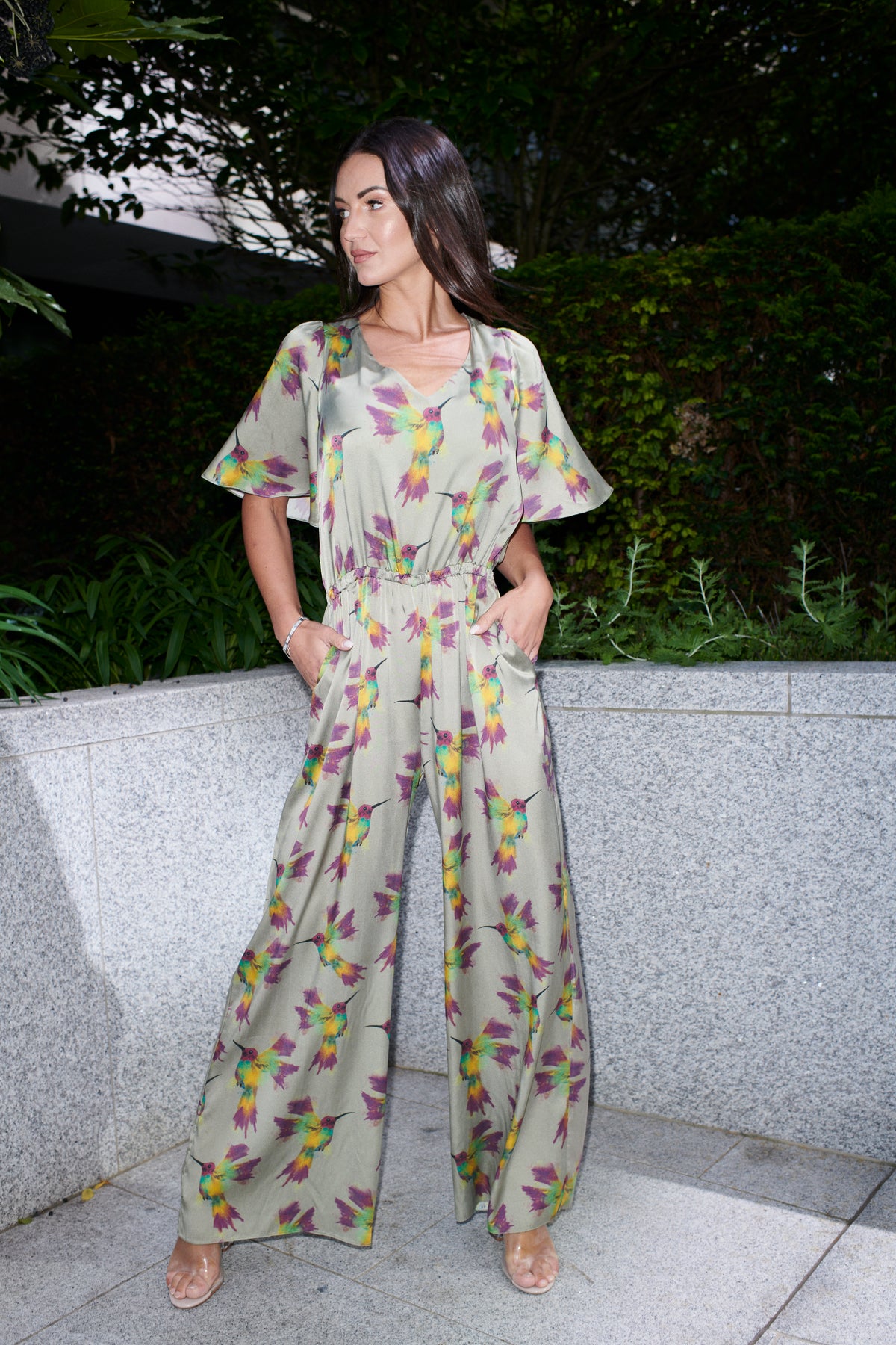 Alina, jumpsuit in hummingbird-print 100% Mulberry silk – on model – Alinari Firenze