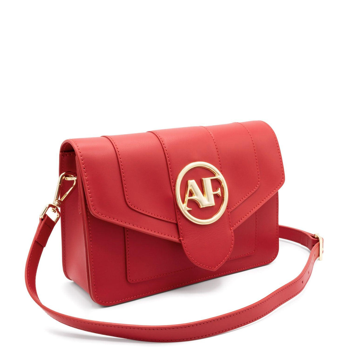 Brera, crossbody bag in red smooth Italian Ruga leather – three-quarter view with strap