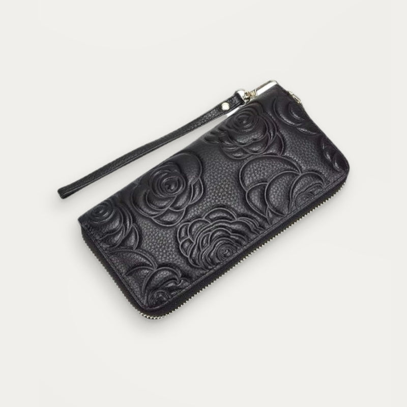 Elegant Wallet, zip-around wallet in black floral-embossed leather – front view – Alinari Firenze