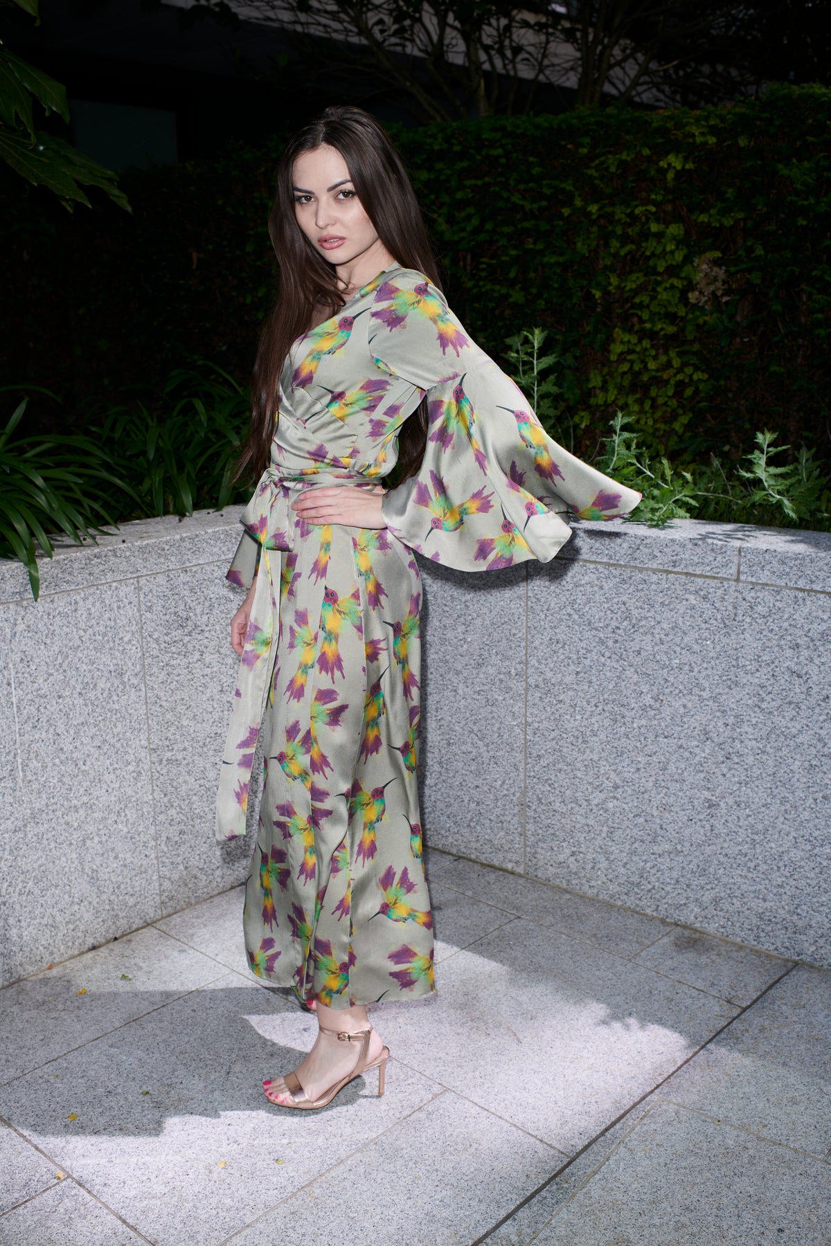 Fiona, wrap dress in sage hummingbird-print 100% Mulberry silk – on model 3 – Alinari Firenze