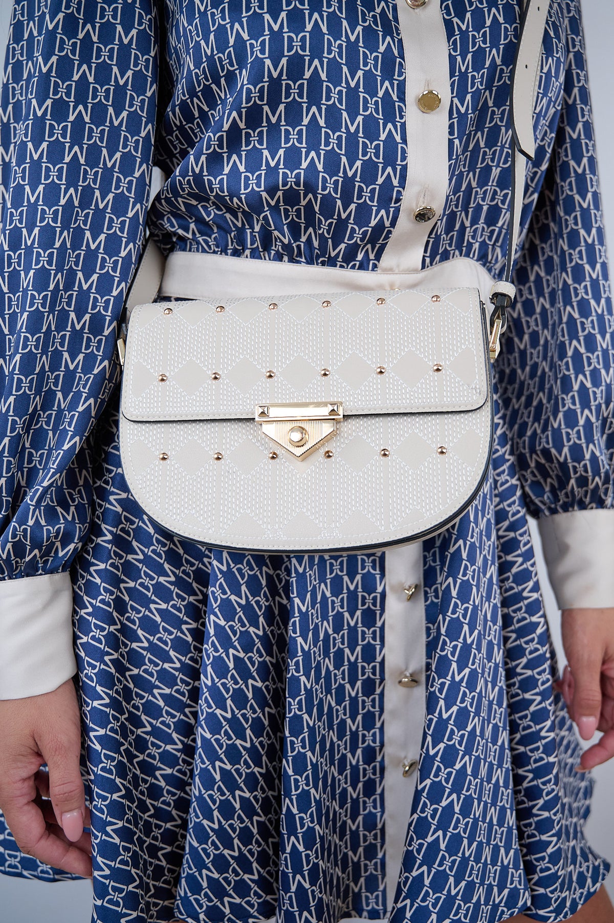 Naelie, crossbody bag in white diamond-quilted Italian leather with gold studs – worn crossbody