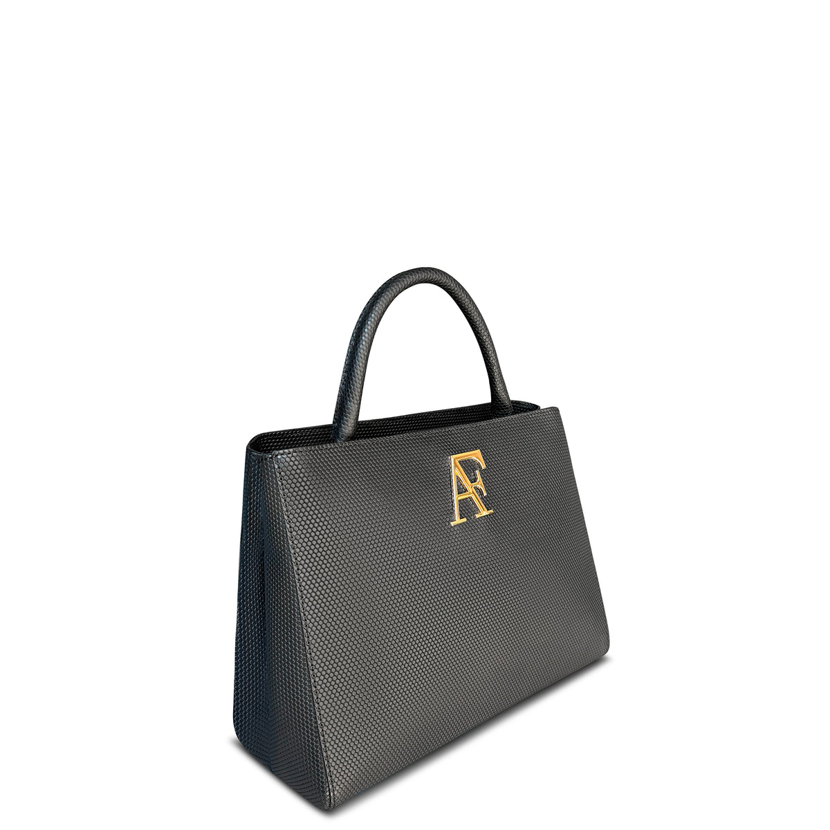 Navona, top-handle bag in black honeycomb-embossed Italian leather – three-quarter view