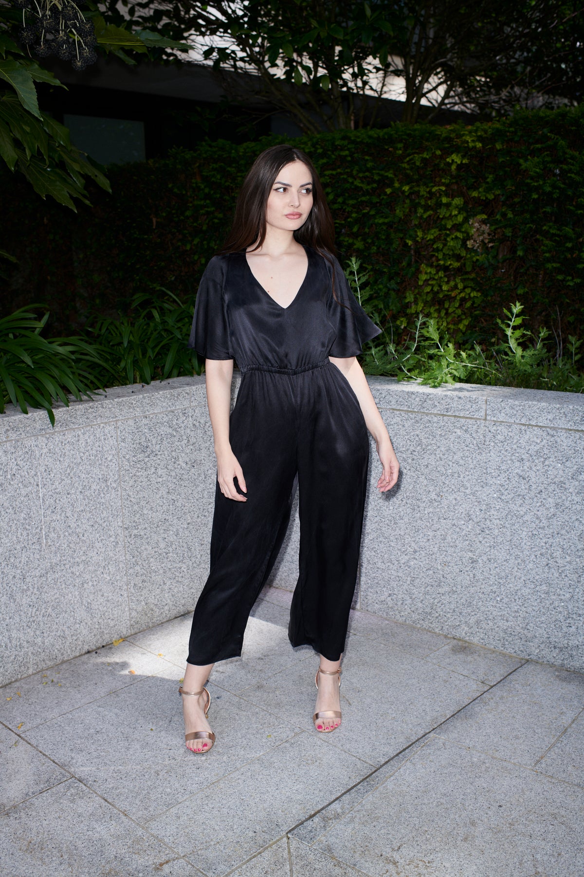 Vittoria, jumpsuit in black 100% Mulberry silk – on model – Alinari Firenze