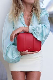 Flavia, crossbody bag in red Italian Ruga leather – styled photo
