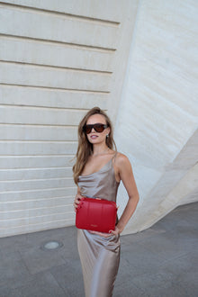 Flavia, crossbody bag in red Italian Ruga leather – worn crossbody