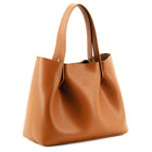 Viviene Tote, slim tote in camel Italian Ruga leather – three-quarter view