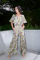 Alina, jumpsuit in hummingbird-print 100% Mulberry silk – on model – Alinari Firenze