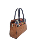 An Alina Tote Bag from Alinarifirenze, made of tan python skin with a leather handle, offers style and functionality.