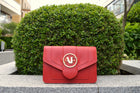 Brera, crossbody bag in red smooth Italian Ruga leather – front view outdoors in daylight