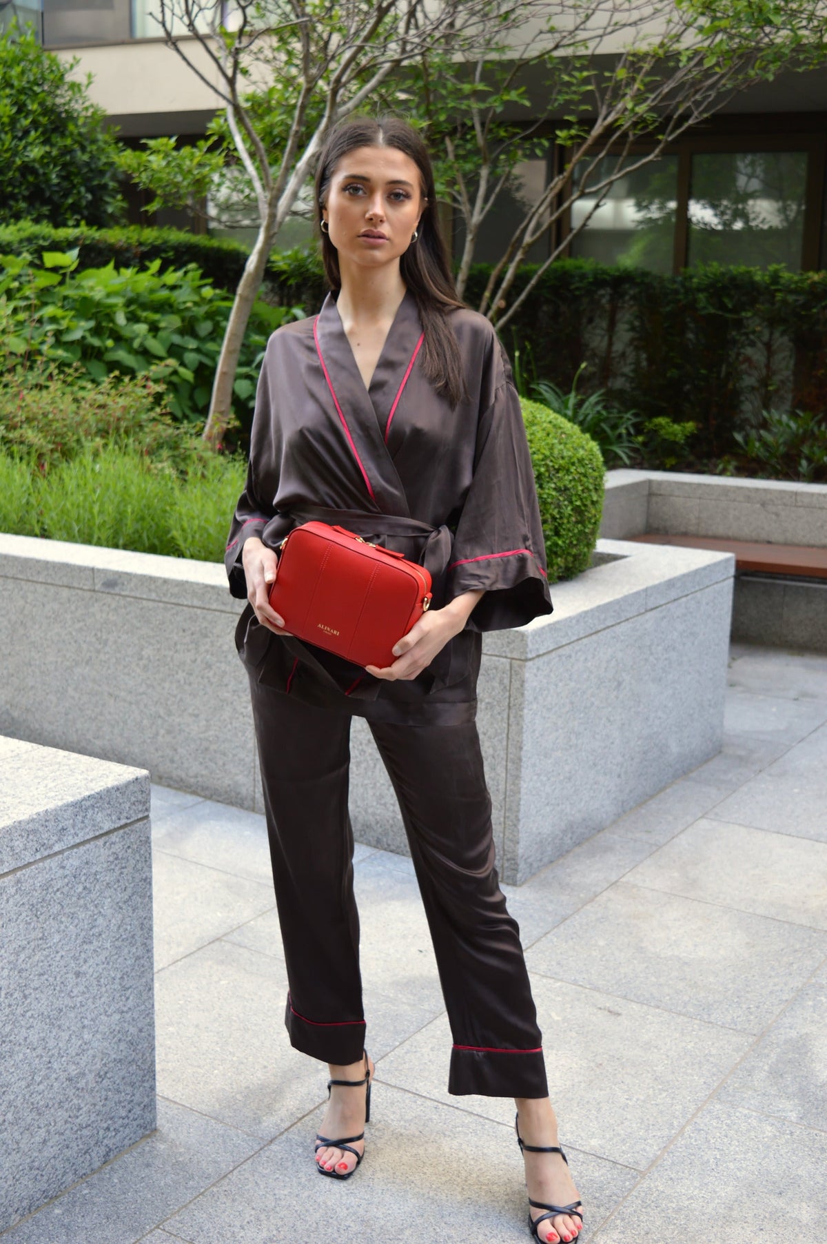 Francesca, kimono top and trouser set in chocolate 100% Mulberry silk – on model, styled with the Flavia crossbody bag in red Italian leather – Alinari Firenze