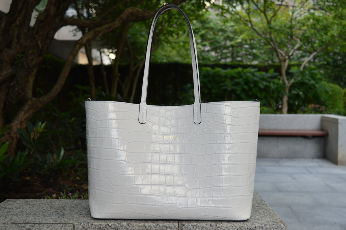 Maxima Croco Tote, laptop tote in white croc-embossed Italian leather – front view outdoors in daylight