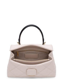 Alita quilted leather shoulder bag in white, open to show the inside