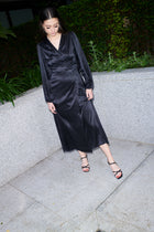 Beatrice, wrap dress in black 100% Mulberry silk – on model 3 – Alinari Firenze