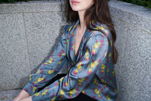 Celestina, blouse in steel blue hummingbird-print 100% Mulberry silk – on model 3 – Alinari Firenze