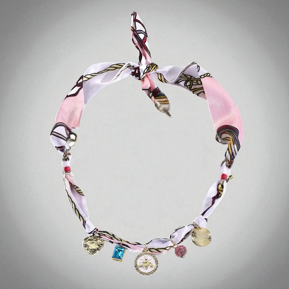 Charm Silk Scarf Necklace, necklace in pink printed scarf and alloy charms – styled view 3 – Alinari Firenze