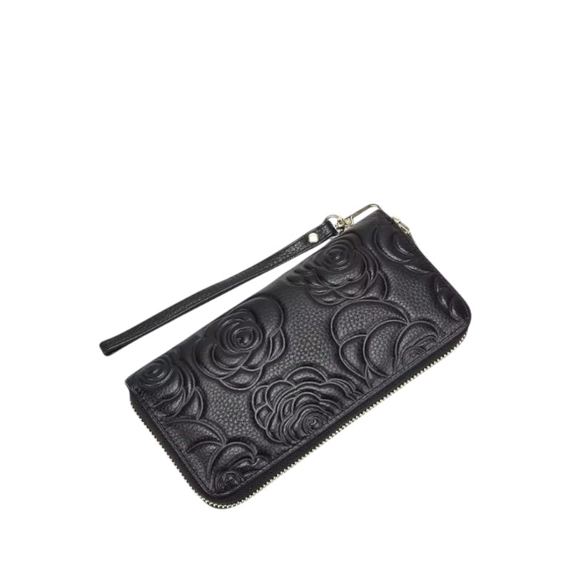 Elegant Wallet, zip-around wallet in black floral-embossed leather – front view – Alinari Firenze