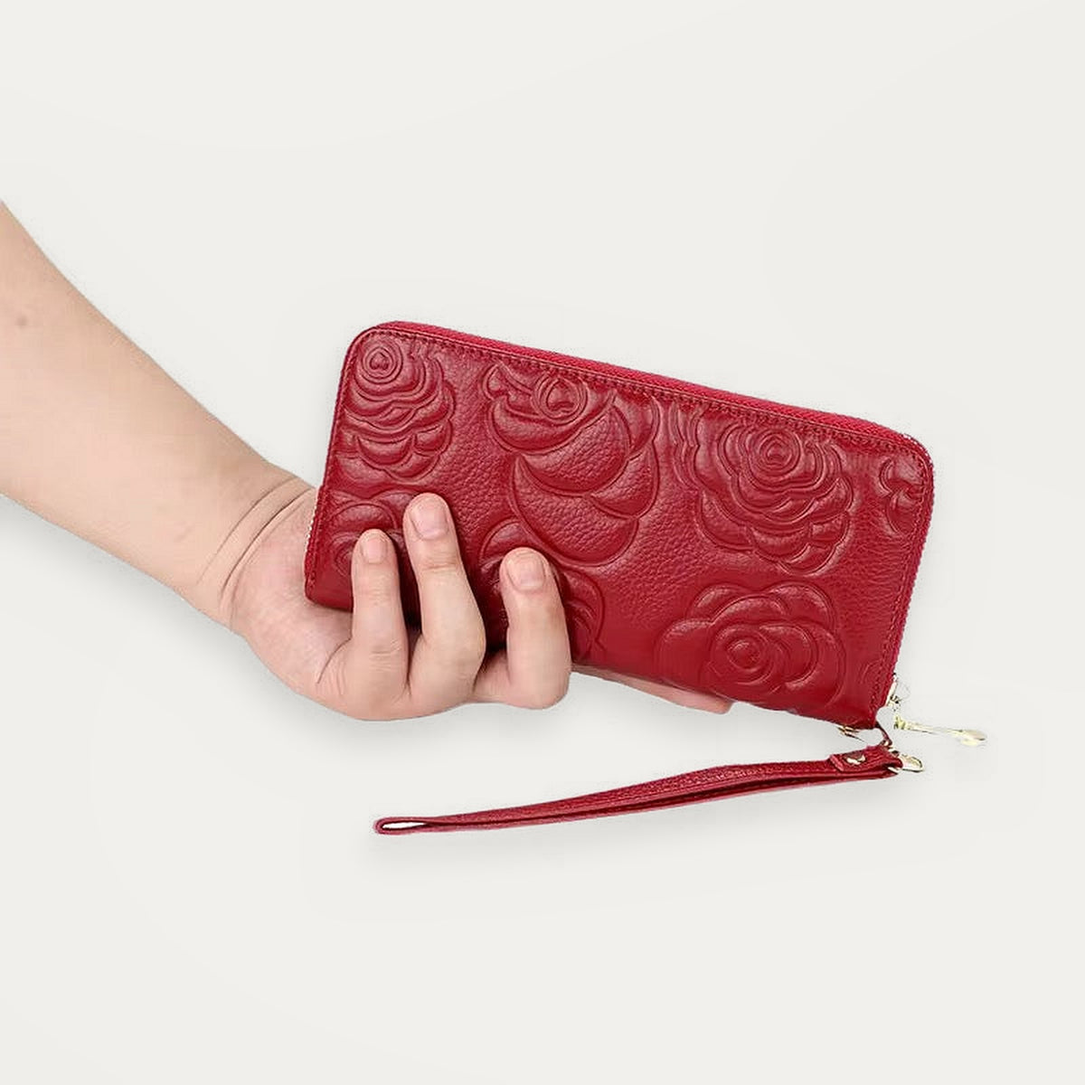 Elegant Wallet, portemonnee met rits rondom van rood leer met bloemenreliëf – productfoto 4 – Alinari Firenze