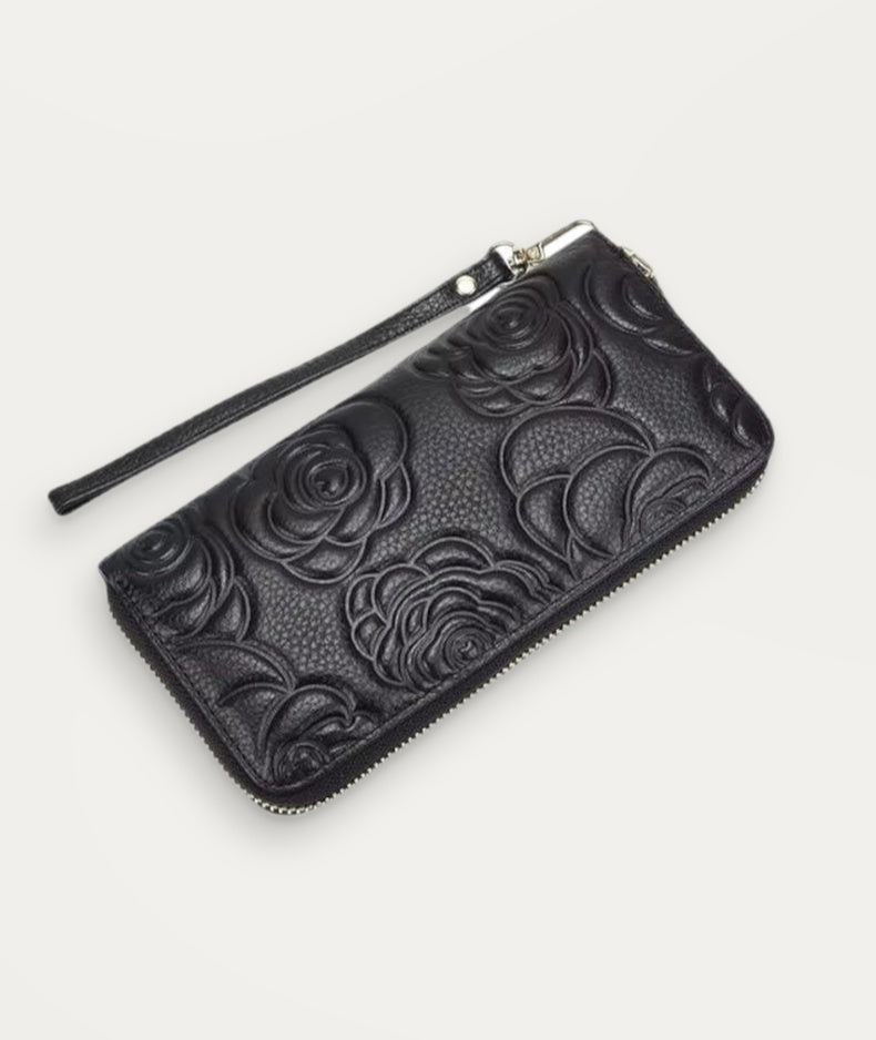 Elegant Wallet, zip-around wallet in black floral-embossed leather – front view – Alinari Firenze