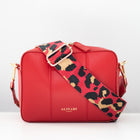 Flavia, crossbody bag in red Italian Ruga leather – front view with shoulder strap