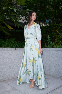 Giulia, silk wrap dress in lemon-print 100% Mulberry silk – on model 2 – Alinari Firenze