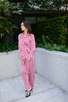 Justina, wrap top and trouser set in raspberry and white striped 100% Mulberry silk – on model 3 – Alinari Firenze