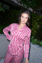 Justina, wrap top and trouser set in raspberry and white striped 100% Mulberry silk – on model 6 – Alinari Firenze