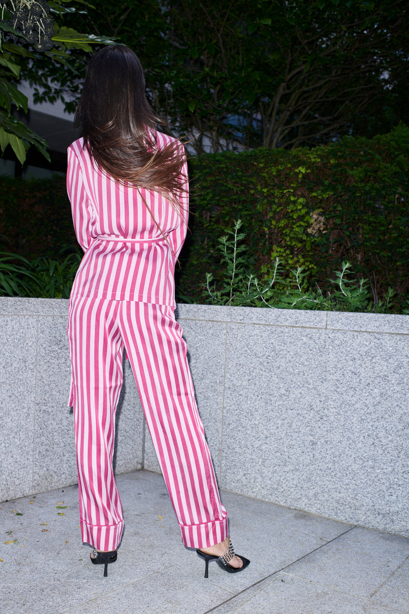 Justina, wrap top and trouser set in raspberry and white striped 100% Mulberry silk – on model – Alinari Firenze