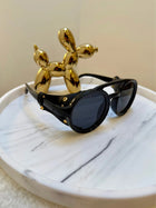 Lunaria, sunglasses in black, UV400 protection – styled view – Alinari Firenze