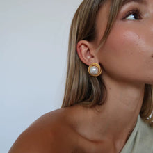 Marina, stud earrings in gold-tone pearl and stainless steel – styled view – Alinari Firenze
