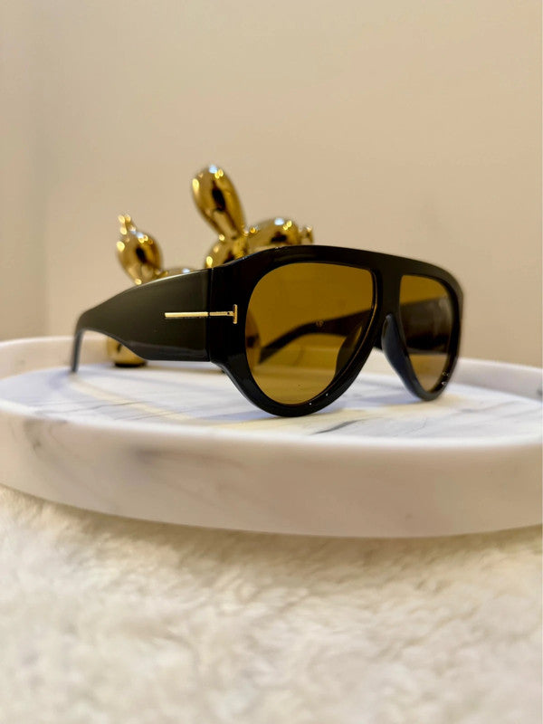Modena, sunglasses in black with amber-tint lenses, UV400 protection – styled view – Alinari Firenze