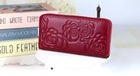 Elegant Wallet, zip-around wallet in red and black floral-embossed leather – video – Alinari Firenze