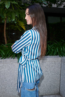 Tiziana, wrap blouse in teal and ivory striped 100% Mulberry silk – on model 3 – Alinari Firenze