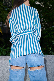 Tiziana, wrap blouse in teal and ivory striped 100% Mulberry silk – on model 4 – Alinari Firenze