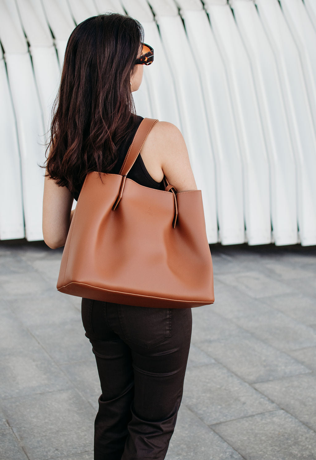 Viviene Tote, slim tote in camel Italian Ruga leather – worn on the shoulder