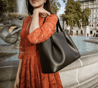 Viviene Tote, slim tote in black Italian Ruga leather – worn on the shoulder